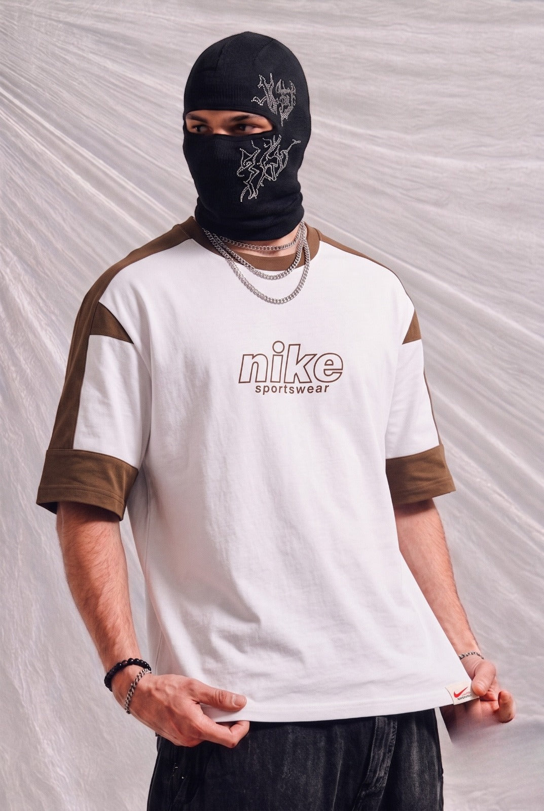 Nike Sportswear Oversized Streetwear Graphic Tee – Off-White & Brown | Elite Garments