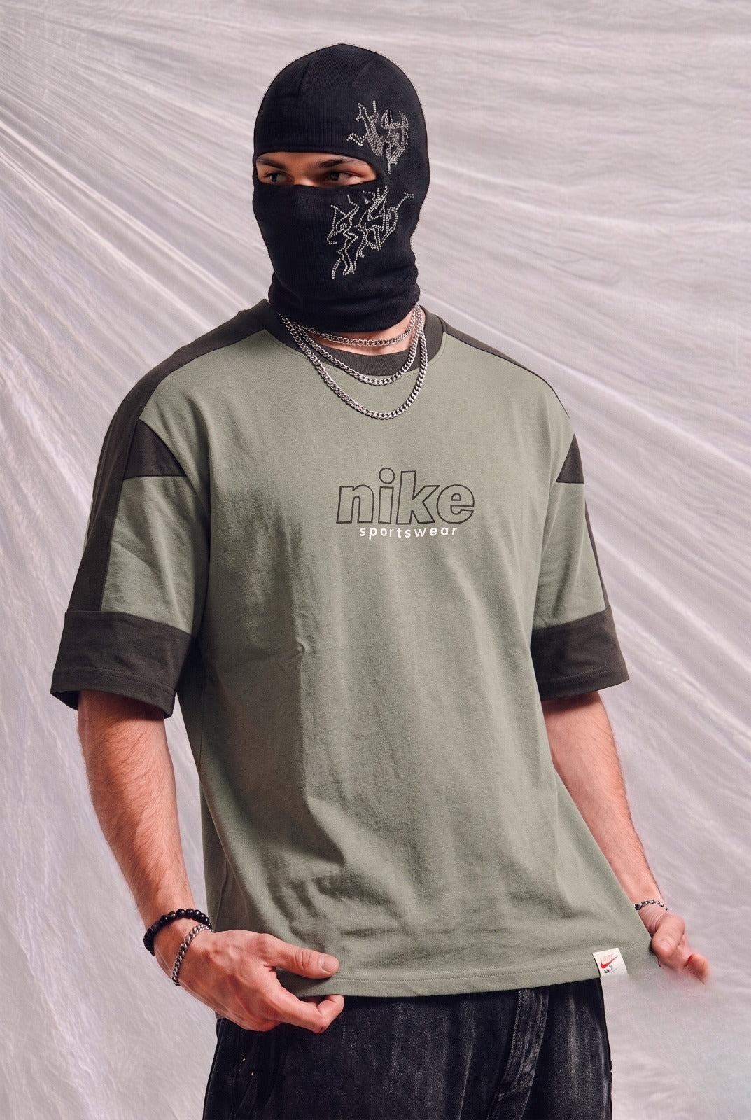 Nike Sportswear Oversized Streetwear Graphic Tee – Off-Green | Elite Garments